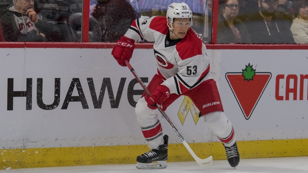 Carolina Hurricanes and Vancouver Canucks Playing Hockey Like It's 1989